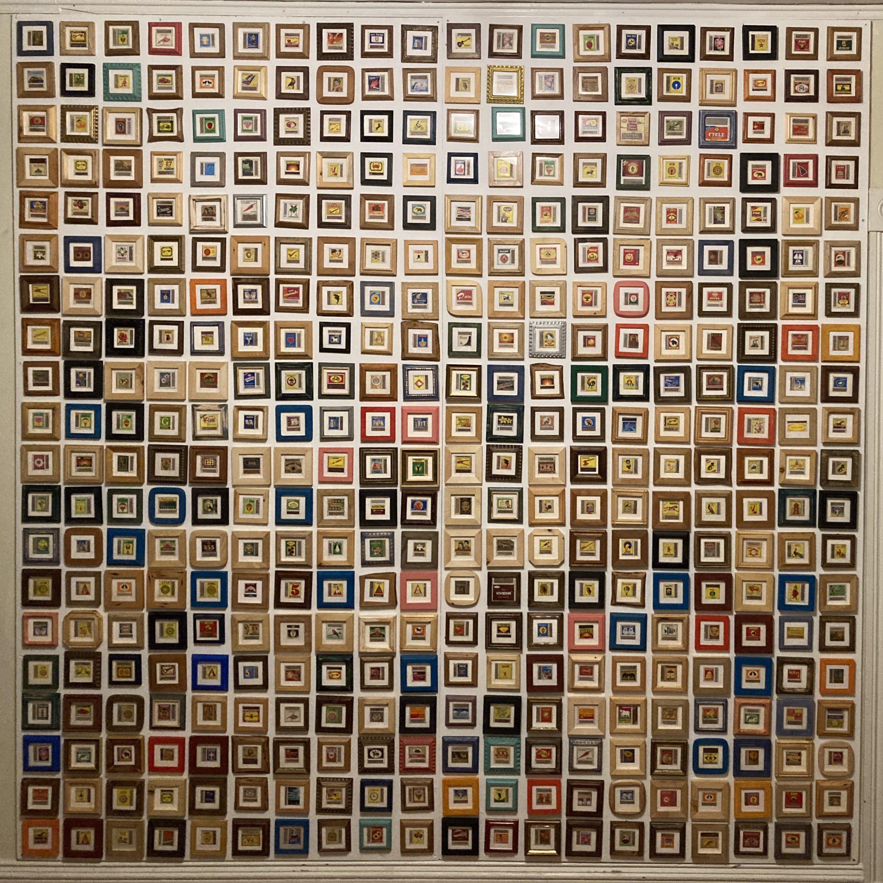 400 unique matchbox brands hung in individual frames.