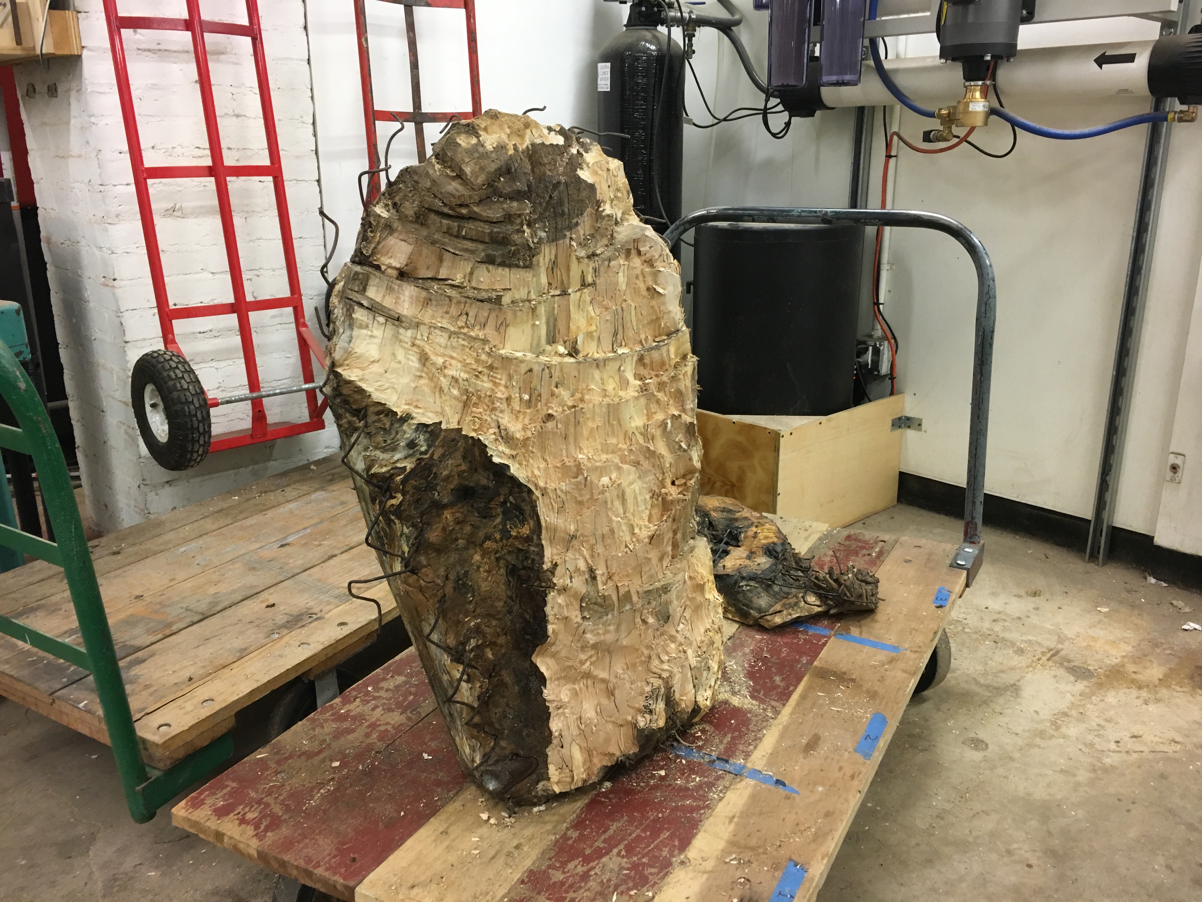 The beginning of the slow process of flattening a large slab with embedded steel.